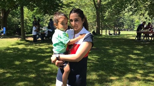 Amandeep and her child in a park