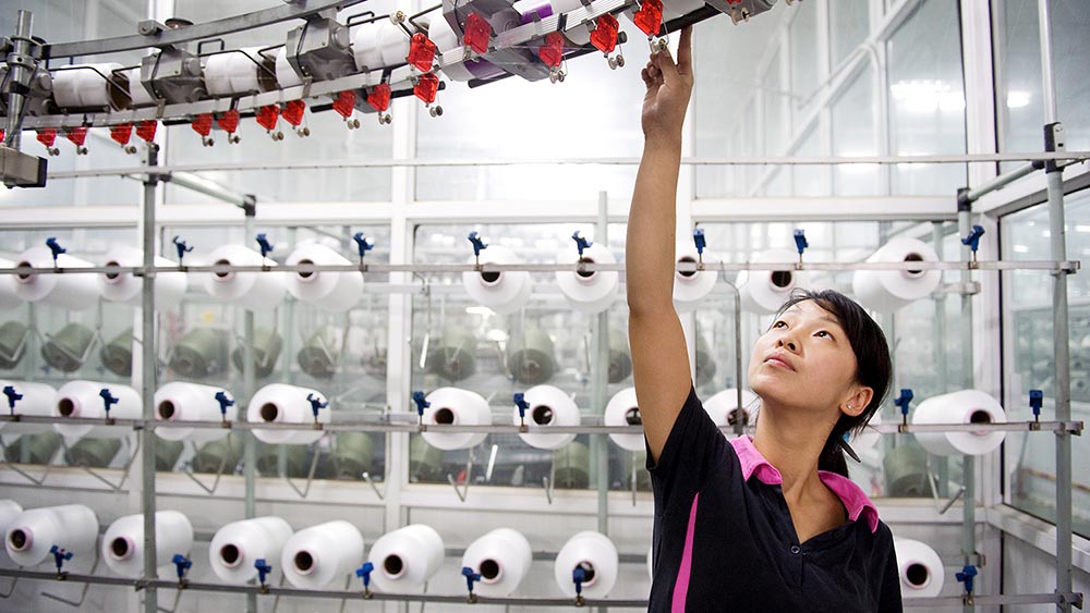 Woman working in a factory setting